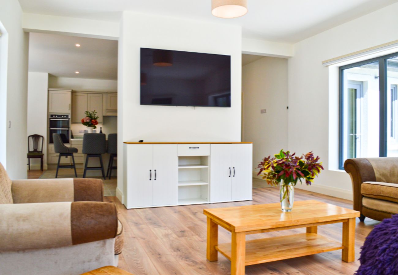 Lough Conn Haven Holiday Home. Large cable TV. Open plan spacious bright lounge. 