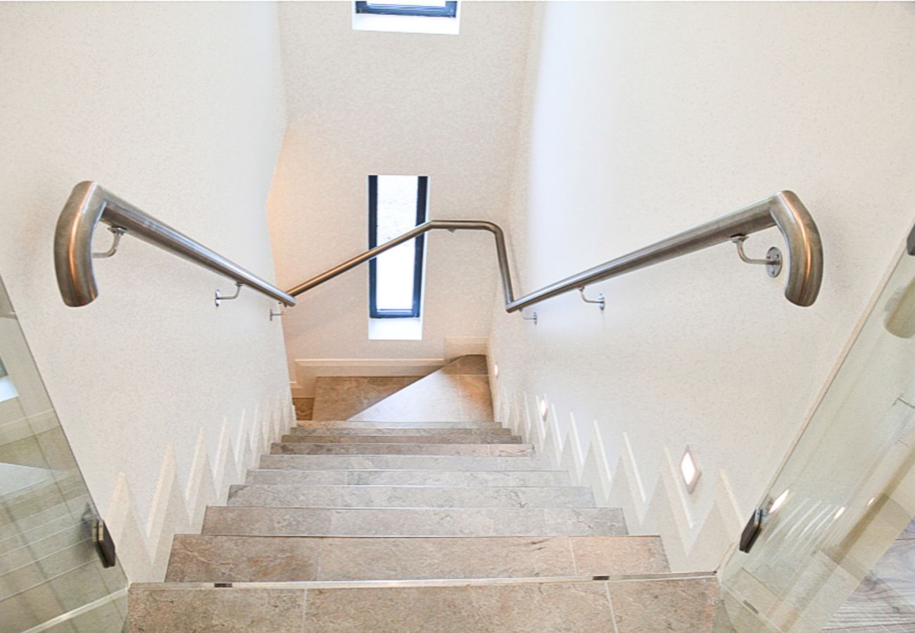 Lough Conn Haven Holiday Home. Stylish staircase. 
