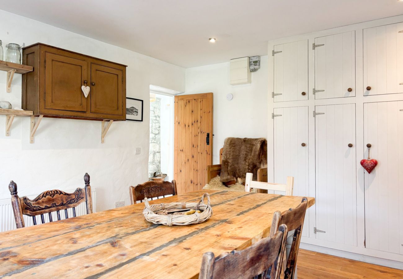 Moyard Stone Cottage, Connemara.  Country cottage style kitchen. Pine table, tasteful interior. 
