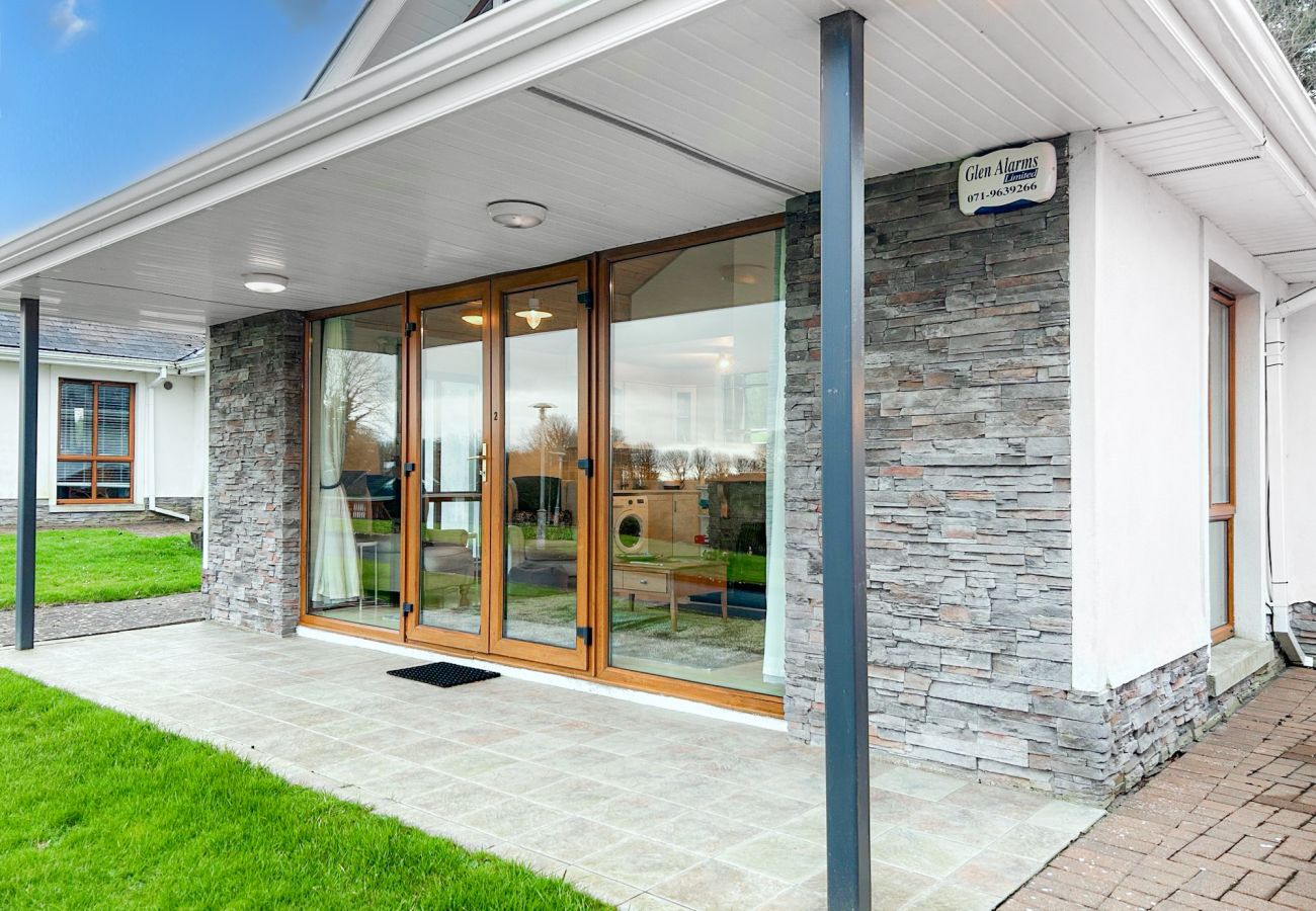 Glasson Mews Holiday Home No. 2. Modern  home with large patio windows. 