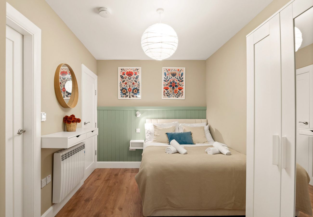 Main Street Hideaway Clifden. Double room with pull out single, bright contemporary design. 