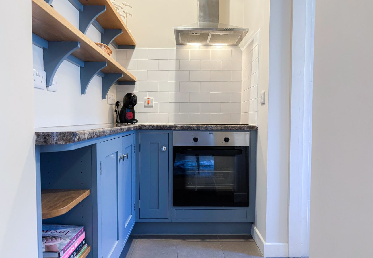 Kylemore Woodland Holiday Cottage. Compact modern kitchen.