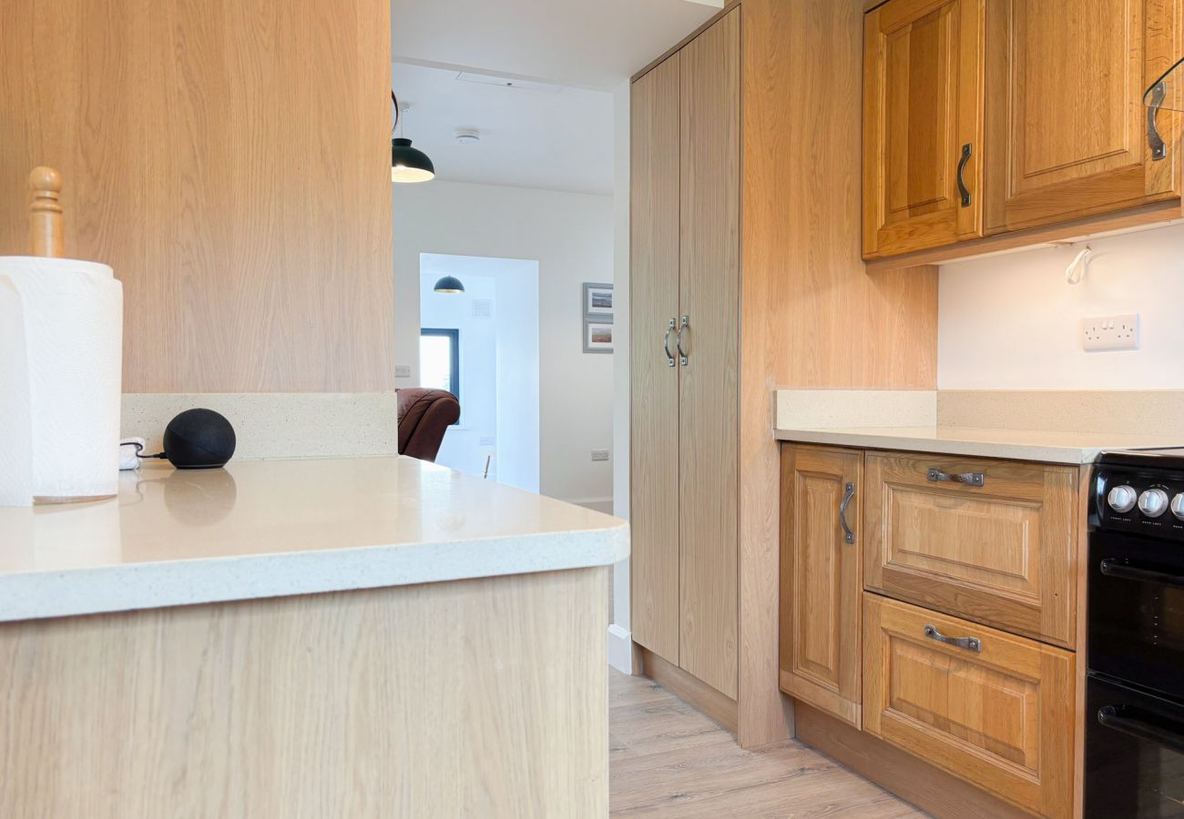 Bluebell Cottage Roundstone. country kitchen with storage