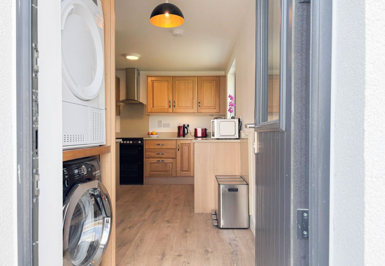 Bluebell Cottage Roundstone. Family holiday home utility room washer dryer